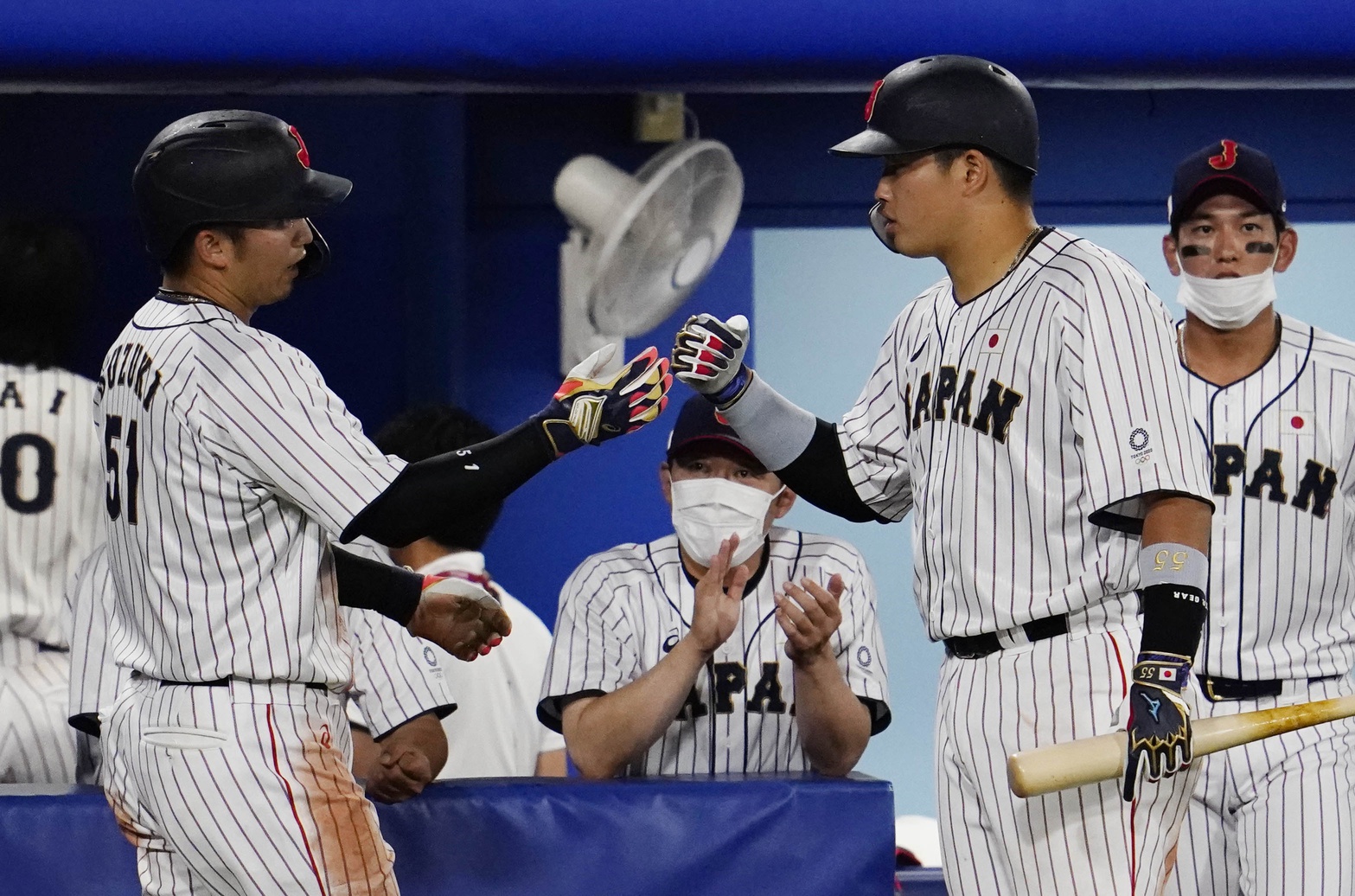 Aug 2, 2021; Yokohama, Japan; Team Japan outfielder Seiya Suzuki (51) celebrates after scoring a run against USA in a second round baseball game during the Tokyo 2020 Olympic Summer Games at Yokohama Baseball Stadium. Mandatory Credit: Mandi Wright-USA TODAY Sports